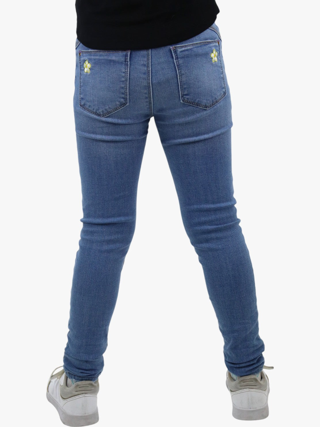 Jeans skinny azul claro con bordado floral