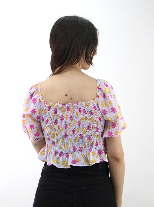 Blusa con estampado floral y cordón delantero
