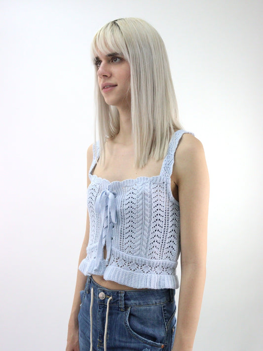 Blusa tejida con cordón ajustador de color azul
