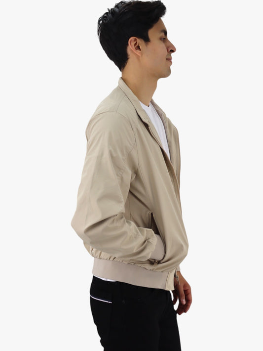 Chamarra bomber de color beige