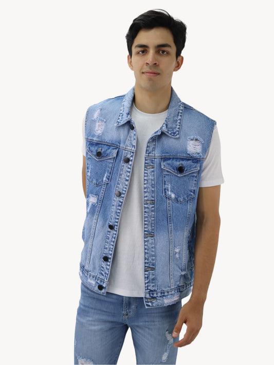 Chaleco denim de color azul medio con destrucción