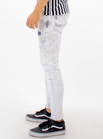 Jeans skinny color gris con snow wash