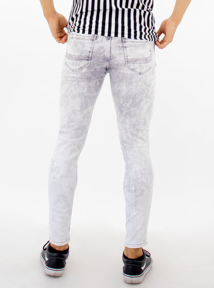 Jeans skinny color gris con snow wash