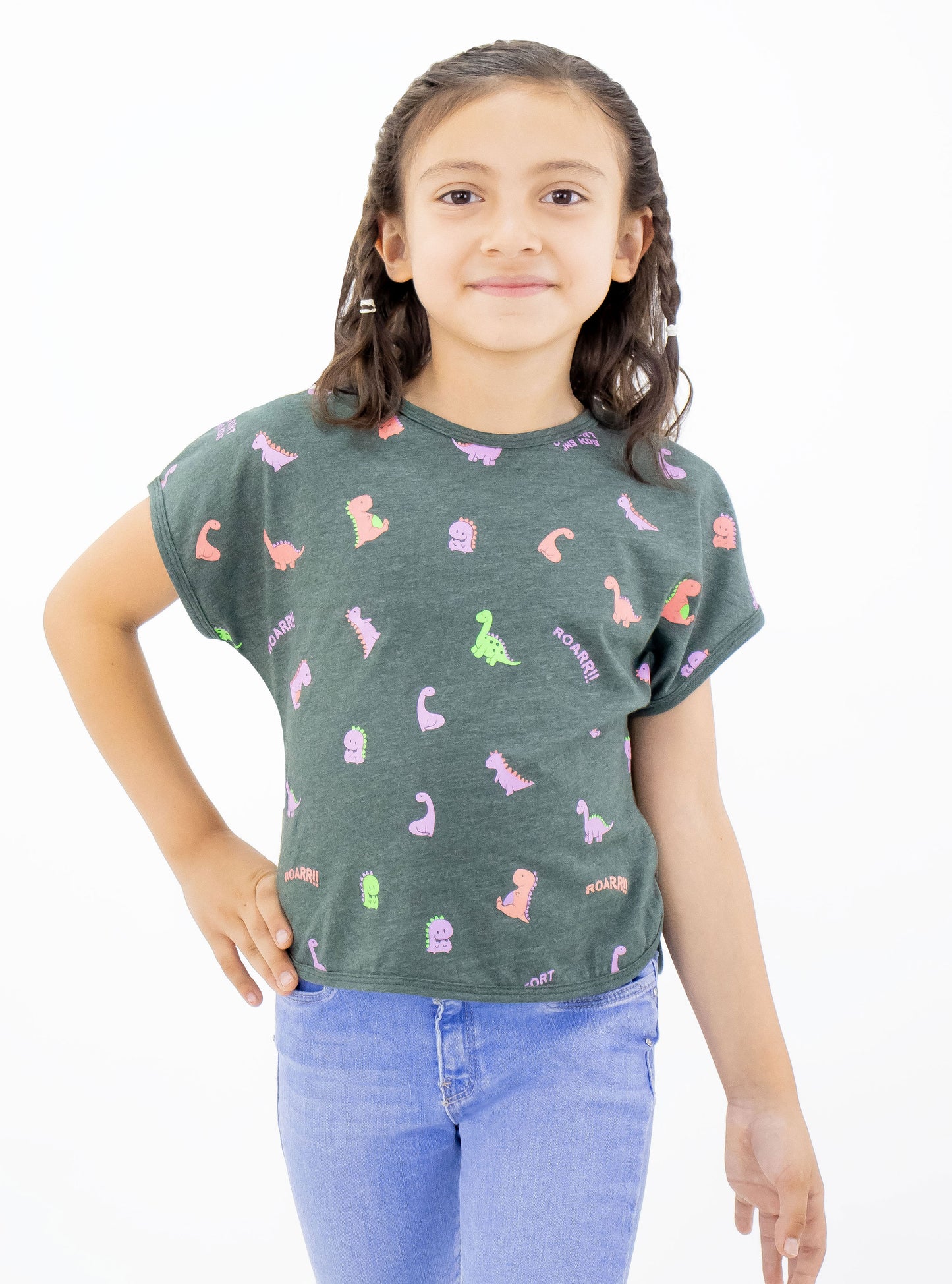 Playera manga corta de color azul con estampado de dinosaurios