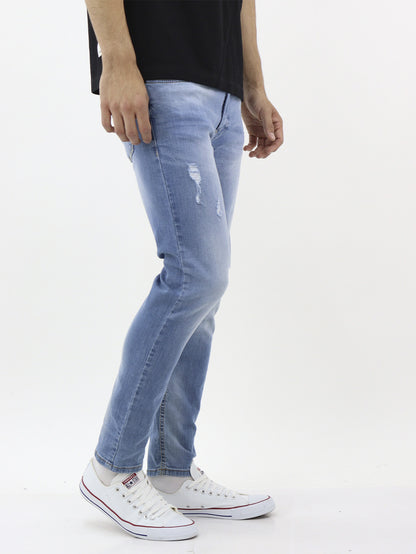 Jeans skinny fit con destrucción