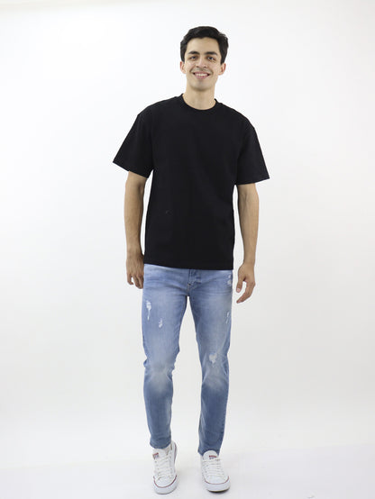 Jeans skinny fit con destrucción