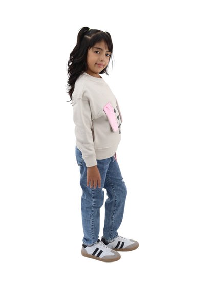 Sudadera beige con diseño de perro