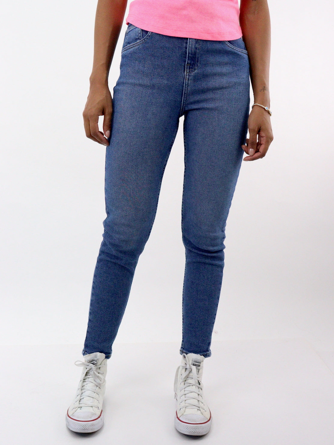 Jeans skinny tiro alto de color azul medio