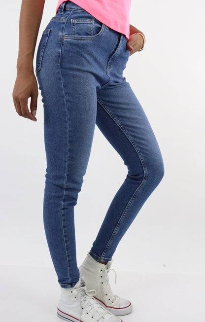 Jeans skinny tiro alto de color azul medio