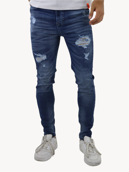 Jeans skinny de color azul deslavado con destrucción (NUEVA TEMPORADA)