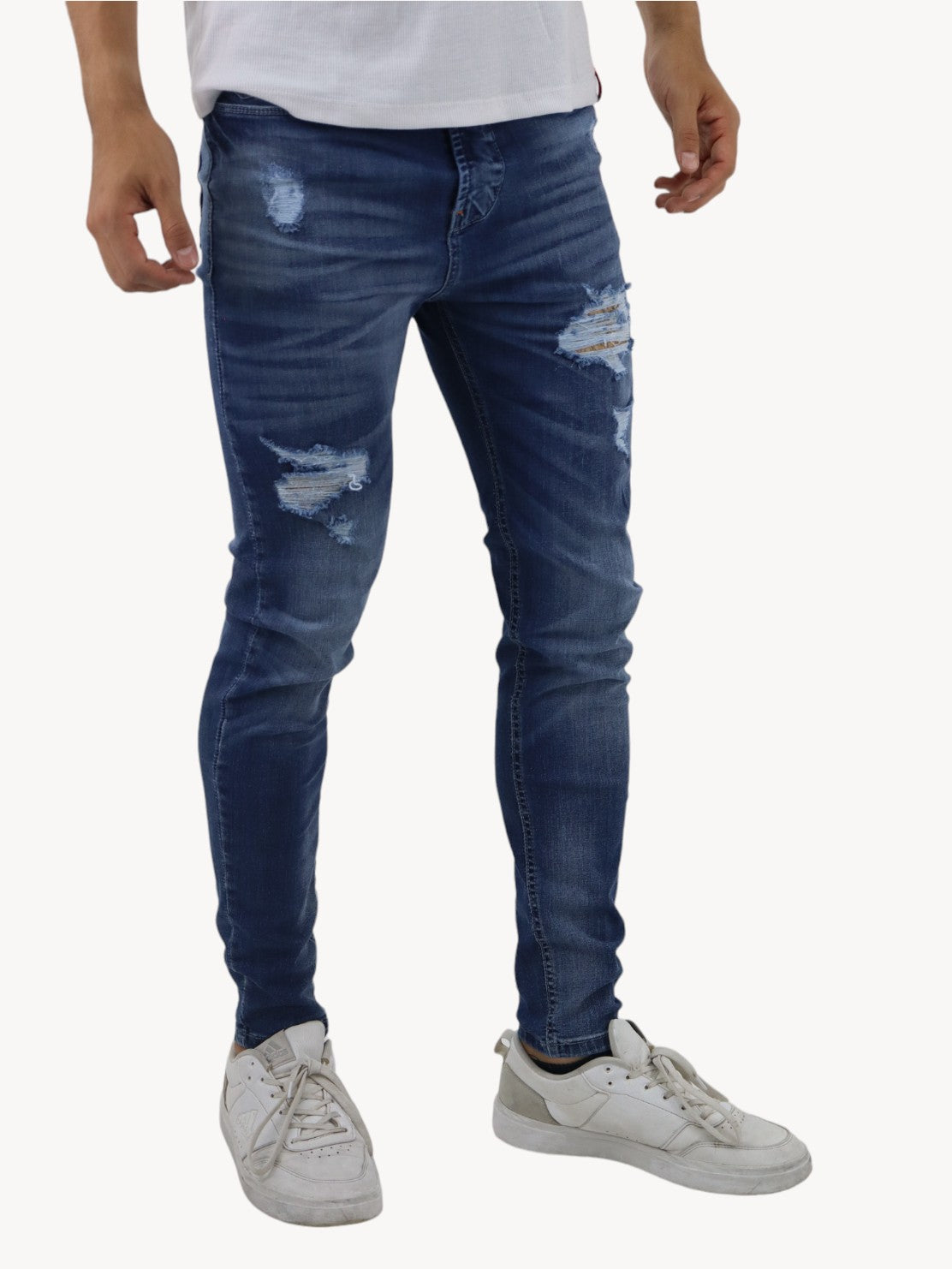 Jeans skinny de color azul deslavado con destrucción (NUEVA TEMPORADA)