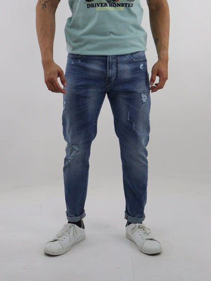 Jeans skinny de color azul medio con destrucción (NUEVA TEMPORADA)