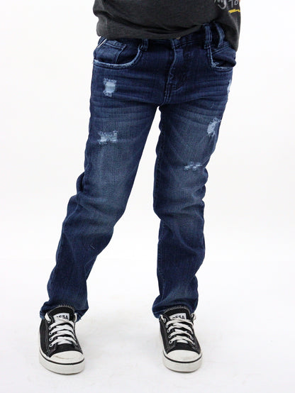 Jeans slim de color azul oscuro con destrucción