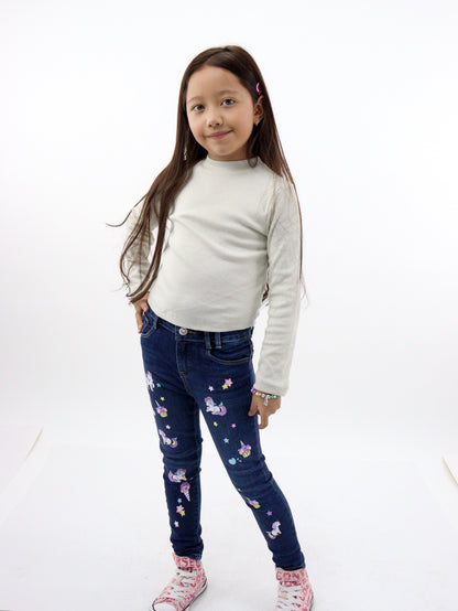 Jeans skinny de color azul oscuro con print de unicornios