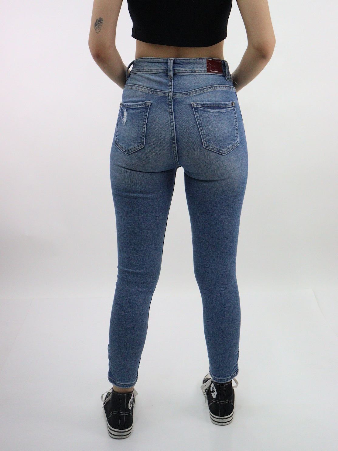 Jeans skinny de color azul medio con destrucción (NUEVA TEMPORADA)