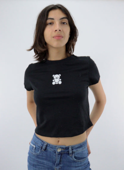 Playera manga corta de color negro con estampado de oso