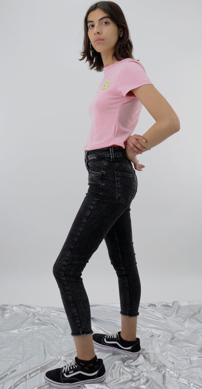 Jeans skinny tiro alto de color negro deslavado