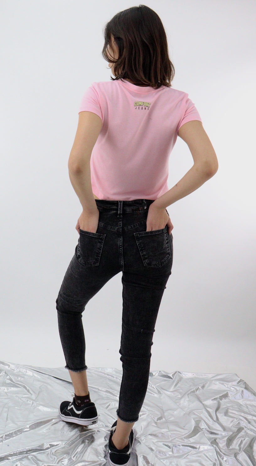 Jeans skinny tiro alto de color negro deslavado