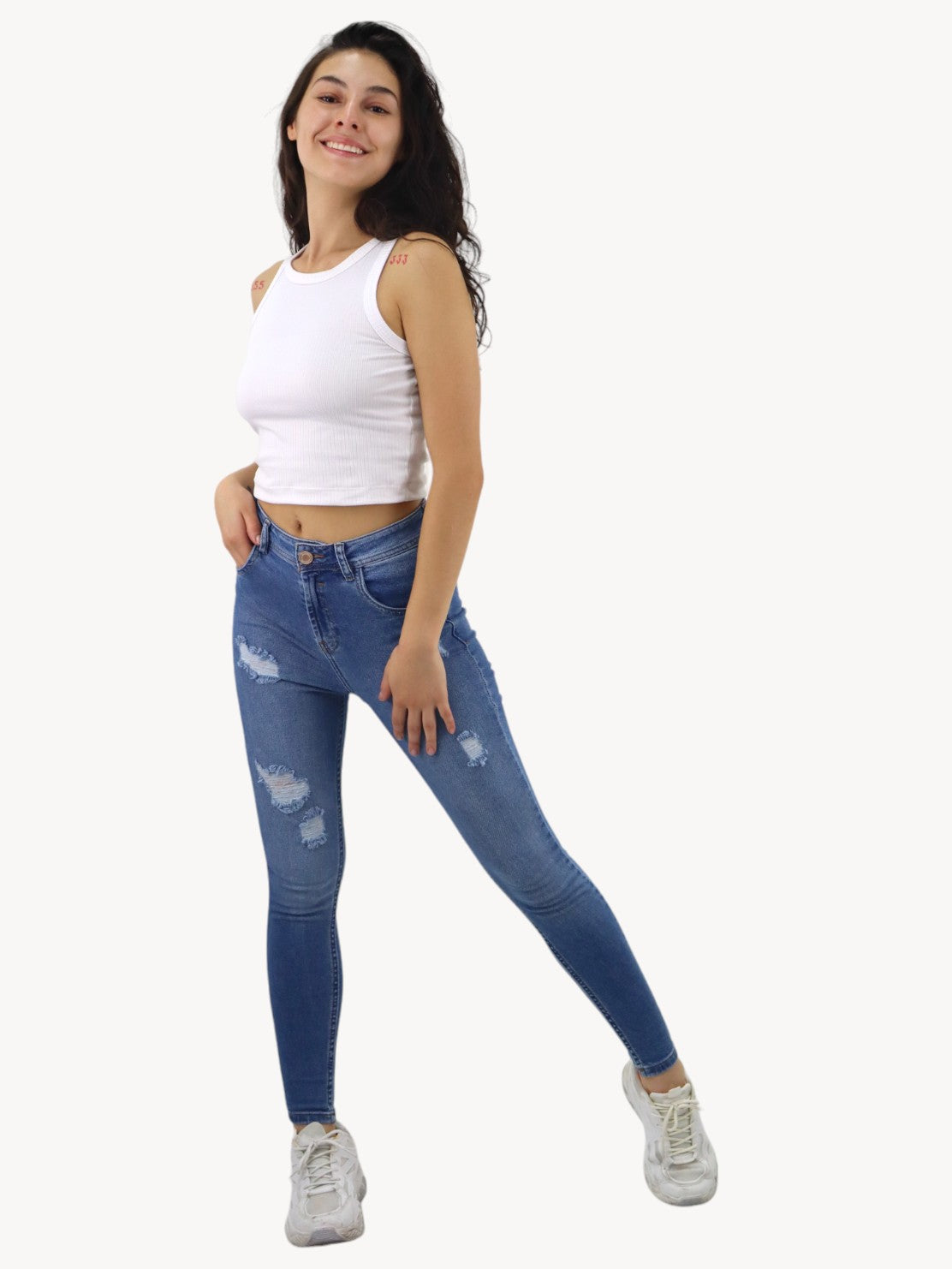 Jeans skinny de color azul medio con destrucción (NUEVA TEMPORADA)