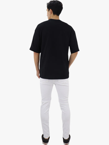 Jeans skinny blanco con destrucción