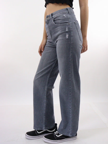 Jeans wide de color gris oscuro con destrucción