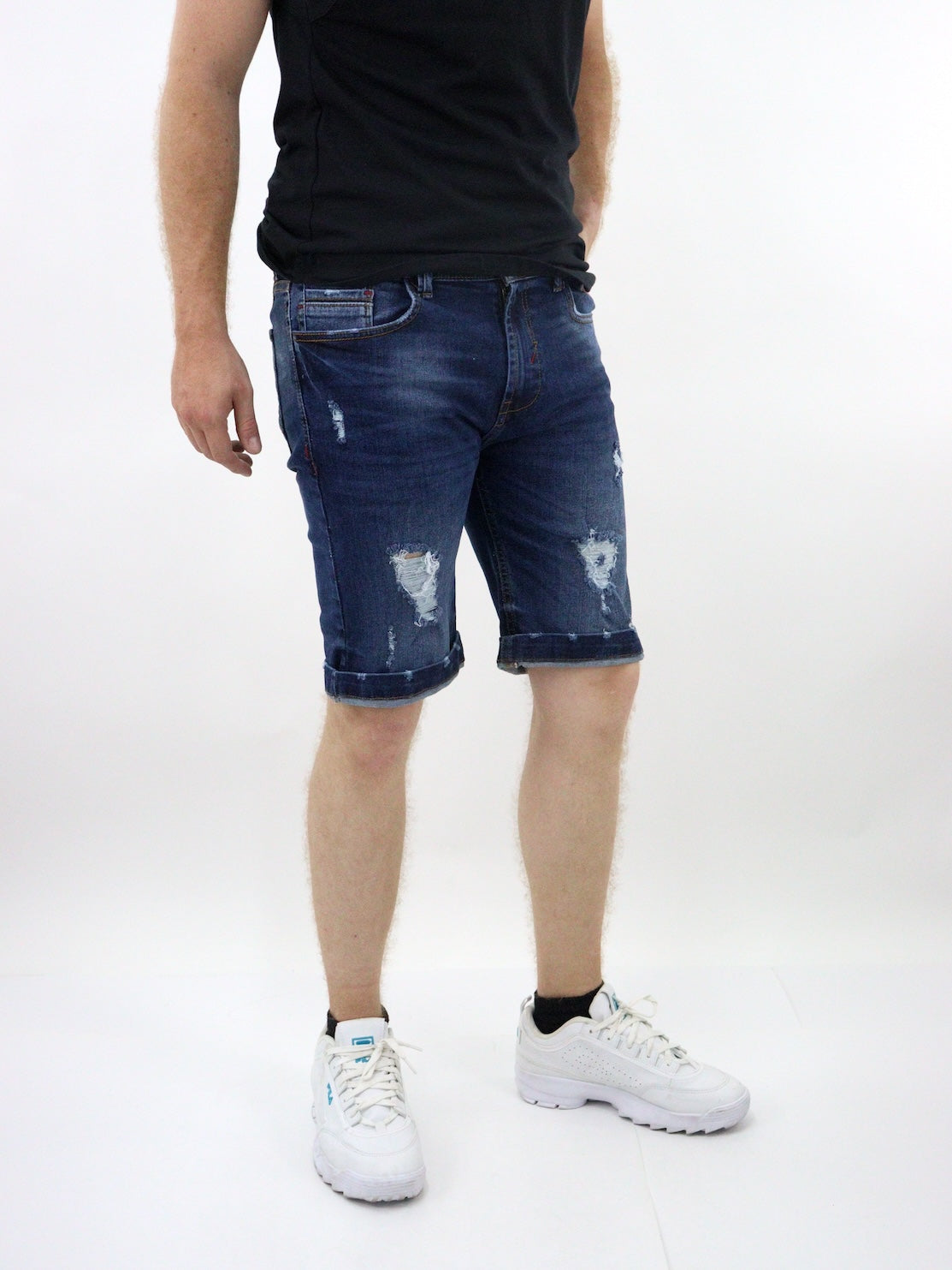 Short denim de color azul oscuro con destrucción (NUEVA TEMPORADA)