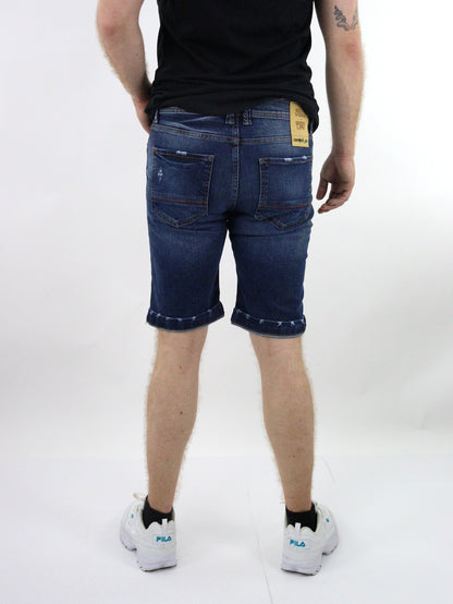 Short denim de color azul oscuro con destrucción (NUEVA TEMPORADA)