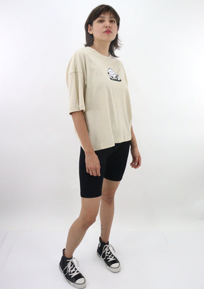 Playera oversize de color beige con estampado (NUEVA TEMPORADA)