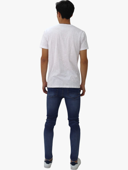 Jeans skinny azul con destrucción