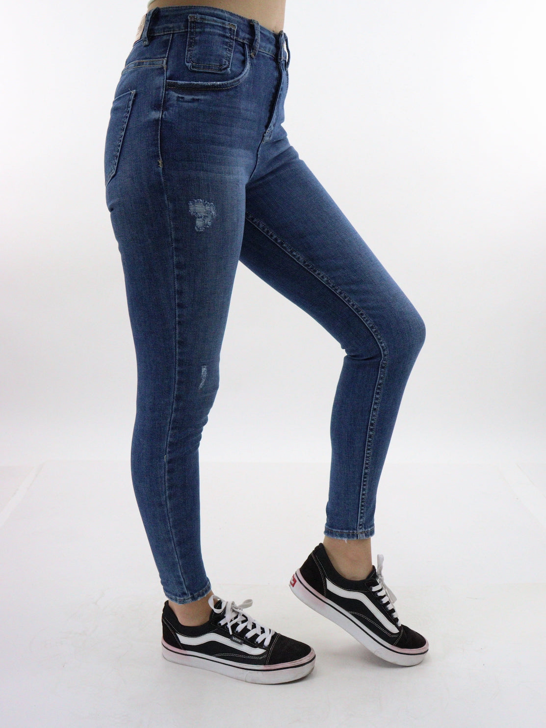 Jeans skinny tiro alto de color azul oscuro con destrucción (NUEVA TEMPORADA)