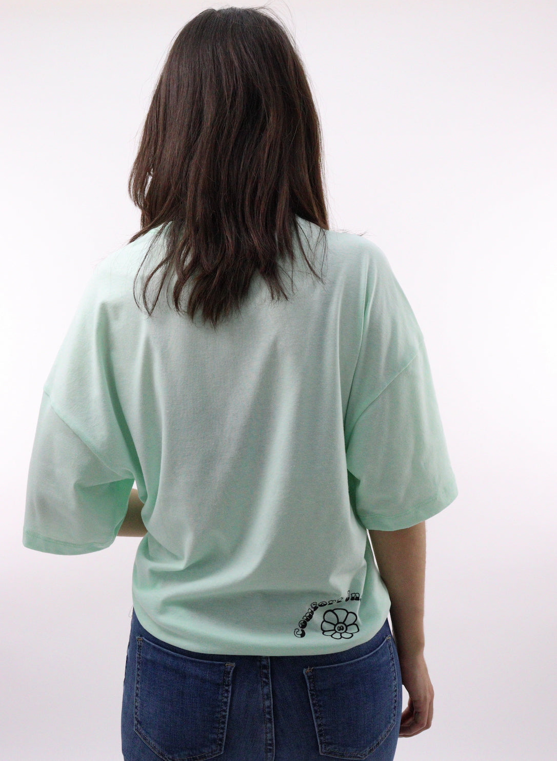 Playera oversize de color verde con estampado sunshine (NUEVA TEMPORADA)