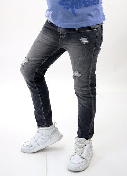 Jeans skinny de color gris oscuro con destrucción (NUEVA TEMPORADA)