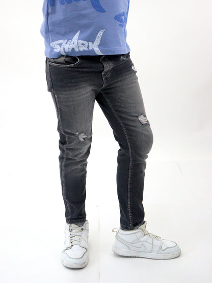 Jeans skinny de color gris oscuro con destrucción (NUEVA TEMPORADA)