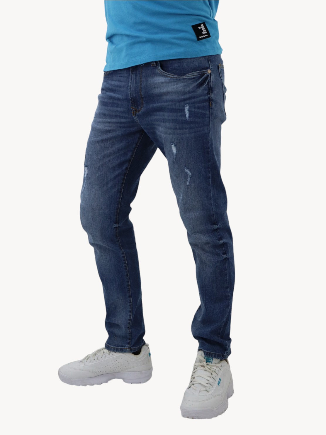 Jeans skinny de color azul medio con destrucción (NUEVA TEMPORADA)