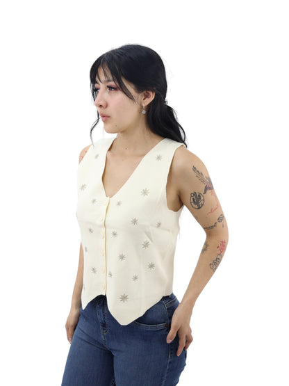 Chaleco beige en cuello V con detalle floral
