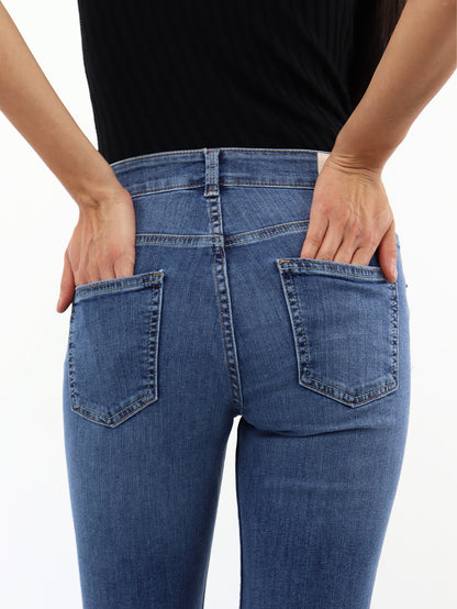 Jeans skinny tiro medio con destrucción