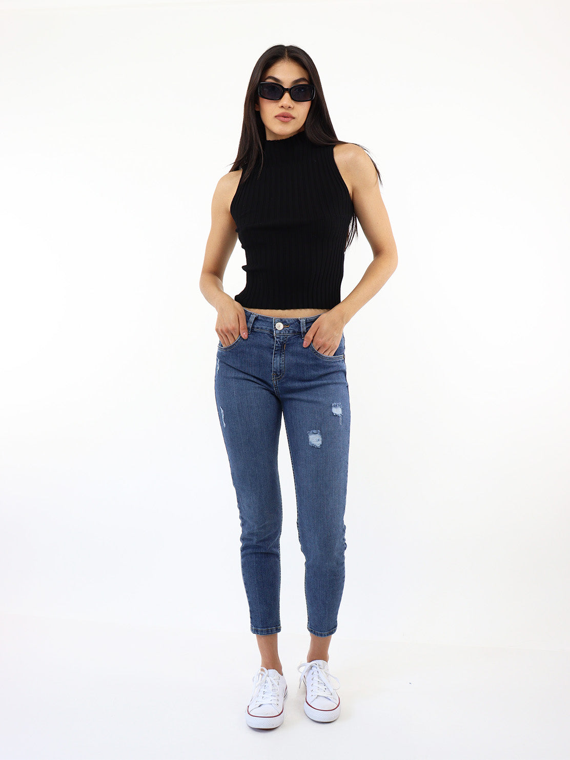 Jeans skinny tiro medio con destrucción